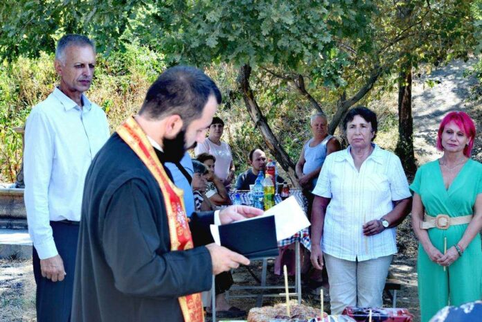 Празникът, Отец Емилиян - курбан за здраве във Войводиново